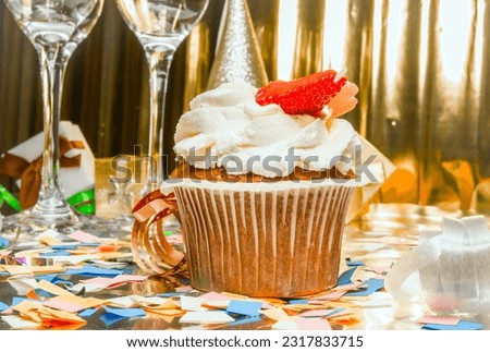 Birthday background with pudding pie. Scenery festive glasses of champagne, anniversary in golden color. Copy space. Happy birthday postcard.