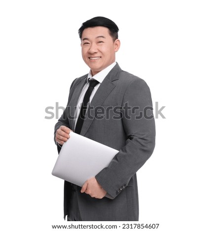 Businessman in suit with laptop posing on white background