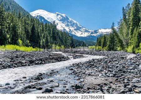 A view of the White River flowing down from Mount Rainier in Washington State. Royalty-Free Stock Photo #2317866081