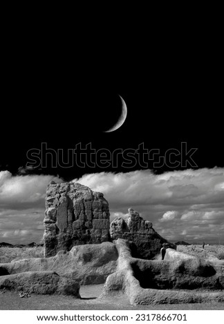 Moonrise over Casa Grande Ruins National Monument of the Pre-columbian Hohokam native Americans in Arizona USA infrared Black and white