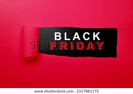 Torn paper with Black Friday text. Black Friday concept