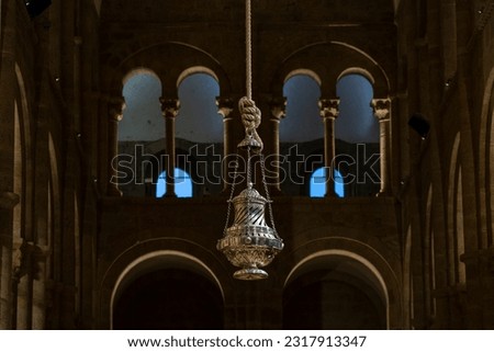 Botafumeiro inside the cathedral of Santiago de Compostela, Spain. Royalty-Free Stock Photo #2317913347