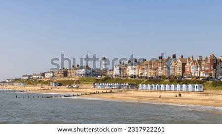 View of Southwold beach seafront from the pier. Southwold, Suffolk, UK Royalty-Free Stock Photo #2317922261