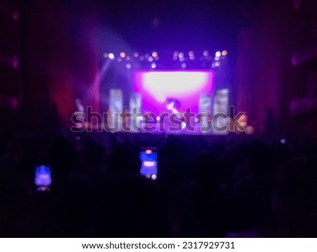Show performance blurred background with neon colors