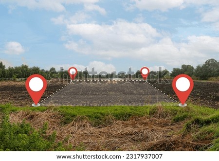 Land plot management - real estate concept with a vacant land on a green field available for building construction and housing subdivision in a residential area for sale, rent, buy or investment. Royalty-Free Stock Photo #2317937007