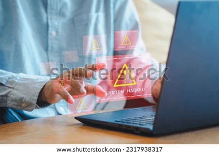 System hacked alert after cyber attack on computer network. compromised information concept. internet virus cyber security and cybercrime. hackers to steal the information is a cybercriminal Royalty-Free Stock Photo #2317938317