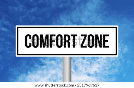 Comfort zone road sign on cloudy sky background