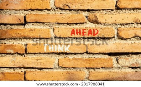 Think ahead symbol. Concept words Think ahead on beautiful brown bricks on a beautiful brick wall background. Business, support, motivation, psychological and think ahead concept. Copy space.