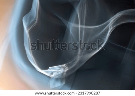 abstract blurred background with white, gray, blue, orange and black smoke