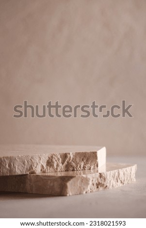 Minimal background for branding and product presentation.natural stone for product display on grey background.copy space.advertising and sale concept