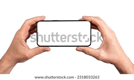 Two hands holding smartphone, blank screen mockup frame, isolated on white background. Royalty-Free Stock Photo #2318033263