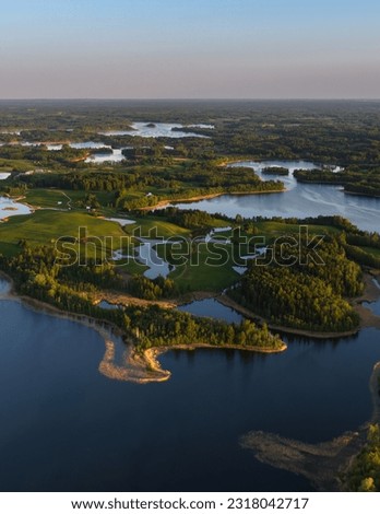 Sunset time bay lake Siver Nature of Latvia, Latgale.