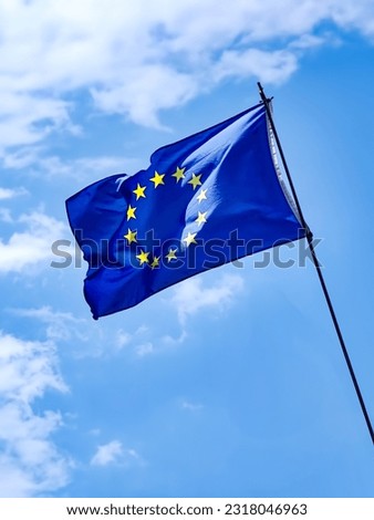 european union flag on a sunny day Royalty-Free Stock Photo #2318046963