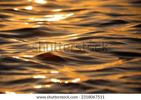 abstract background of waves at sunset