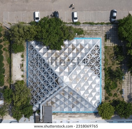 top view of a glass building in the shape of a cube. The architecture of Soviet brutalism and the Soviet construction of the sanatorium. pyramid of glass in Odessa, Ukraine. High quality photos.