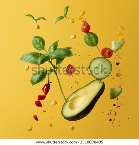 avocados and other fruits that were photographed using a yellow background