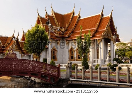 Wat Benchamabophit is in Bangkok Thailand. It is a Buddhist temple, also known as the Marble Temple.  Royalty-Free Stock Photo #2318112955