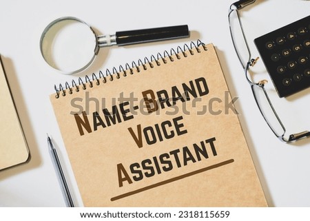 Notepad with the text Name Brand Voice Assistant (NBVA) ON DESK. NBVA allows to dialogue directly with consumers by it's brand voice. Digital audio marketing concept