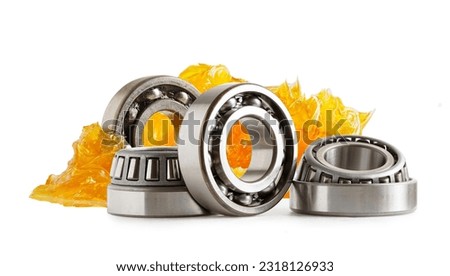 Grease and ball bearing, Blue premium quality synthetic lithium complex grease, high temperatures and machinery lubrication for automotive and industrial. Royalty-Free Stock Photo #2318126933