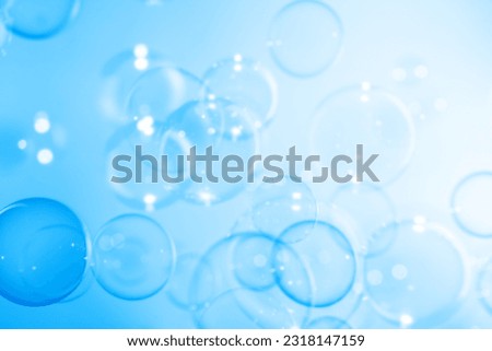 Beautiful Transparent Blue Soap Bubbles Floating in The Air. Abstract Background. Celebration Festive Backdrop. Freshness Soap Suds Bubbles Water	
