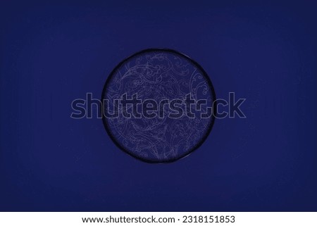 Blue Abstract Background with florid patterned design emblem encased in metal ring. Vector Illustration. EPS 10. Royalty-Free Stock Photo #2318151853
