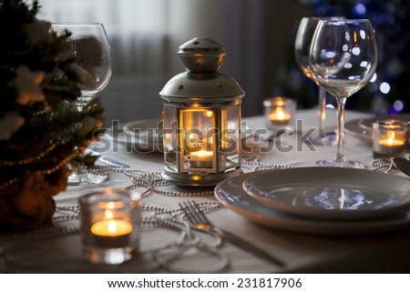 Christmas table with torch at home