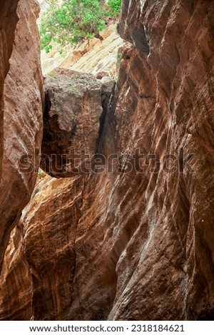 Avakas Gorge in Paphos District with a huge stone wedged between two walls. Nature trail Royalty-Free Stock Photo #2318184621