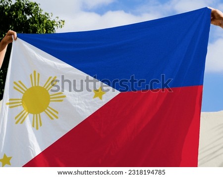 philippines flag. Large Philippines flag waving in the wind. Philippines Independence Day. Philippine memorial holiday. June 12. Philippines national flag waving.
