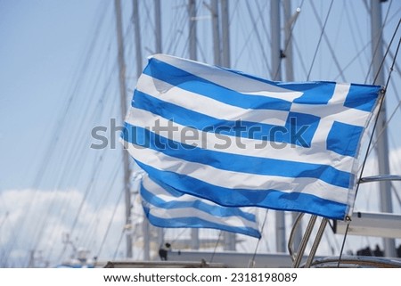 Greek flag waving over yacht in Rhodes  marine 