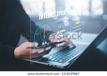 Fast internet connection with Metaverse technology concept, Programmer people working  laptop with Virtual screen of Internet speed measurement, Internet and technology concept, 6G High-speed internet Royalty-Free Stock Photo #2318239887