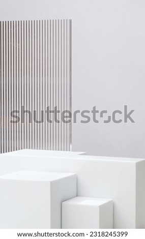 White block pedestal product display grey background with modern Transparency strip glass with sunshine light Royalty-Free Stock Photo #2318245399