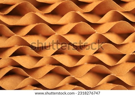 Macro shot of a paper cooling pad made of water cooled paper used for cooling in animal houses or cooling water in various applications. Reduces air temperature by evaporation of water.