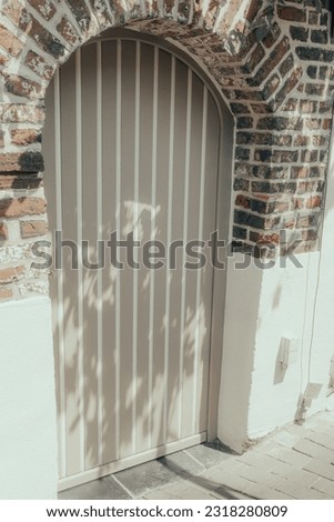 old wooden door in a stone wall,rustic door,Old Wooden Door of a Rustic House