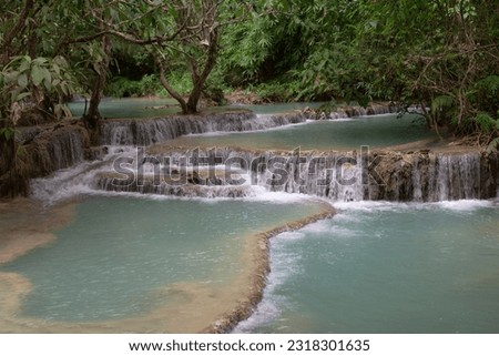 Kuang Si Beautiful Waterfallsin  Luang Phrabang, Laos.         