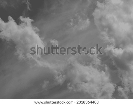 Enchanting black and white photograph of clouds - a majestic visual embodiment.