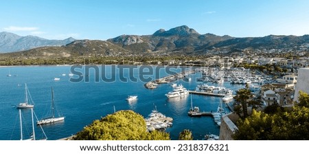 Calvi Historic City Center with Historic Houses and Harbor with Yachts, Corsica Island, France Royalty-Free Stock Photo #2318376321
