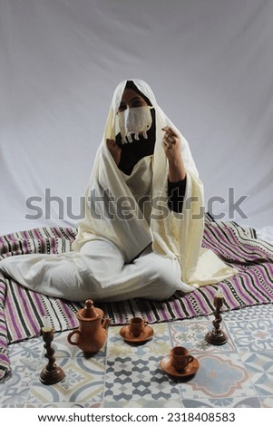 beautiful Algerian Woman wearing hayak  Royalty-Free Stock Photo #2318408583