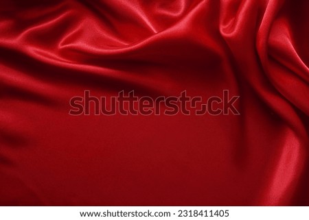 red fabric texture empty as waves (spot focus) Royalty-Free Stock Photo #2318411405