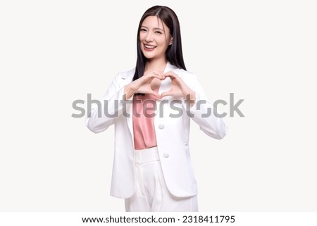 Beauty Asian woman making heart shape hand sign isolated on white background.