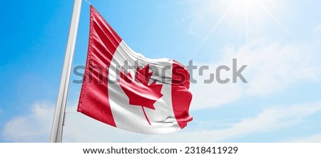 canada flag waving on a high quality blue cloudy sky