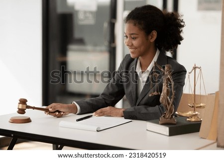 Asian woman lawyer businesswoman Working to view legal documents at the office