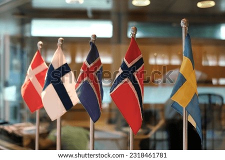 flags of scandinavic countries denmark, iceland, faroer, norway and sweden Royalty-Free Stock Photo #2318461781