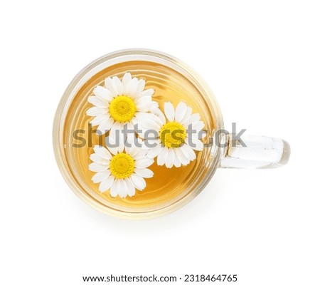 Cup of hot chamomile tea isolated on white background Royalty-Free Stock Photo #2318464765