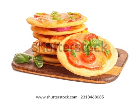 Board with tasty mini pizzas on white background Royalty-Free Stock Photo #2318468085