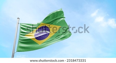 brazil flag waving on a high quality blue cloudy sky