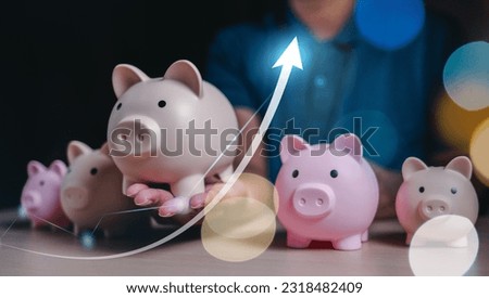 piggy bank, financial, banking, finance, investment, profit, money, wealth, asset, growth. in hand hold a piggy bank then line curved is growth up investment and financial asset then take profit.
