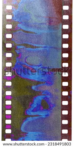 Start of 35mm negative filmstrip, real scan of film material with cool scanning light interferences on the material.