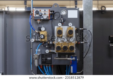 pneumatic control system on the machine, close up Royalty-Free Stock Photo #2318512879