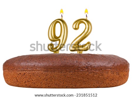 birthday cake with candles number 92 isolated on white background