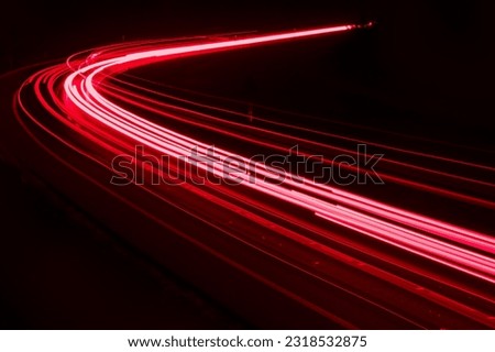 lights of cars driving at night. long exposure Royalty-Free Stock Photo #2318532875